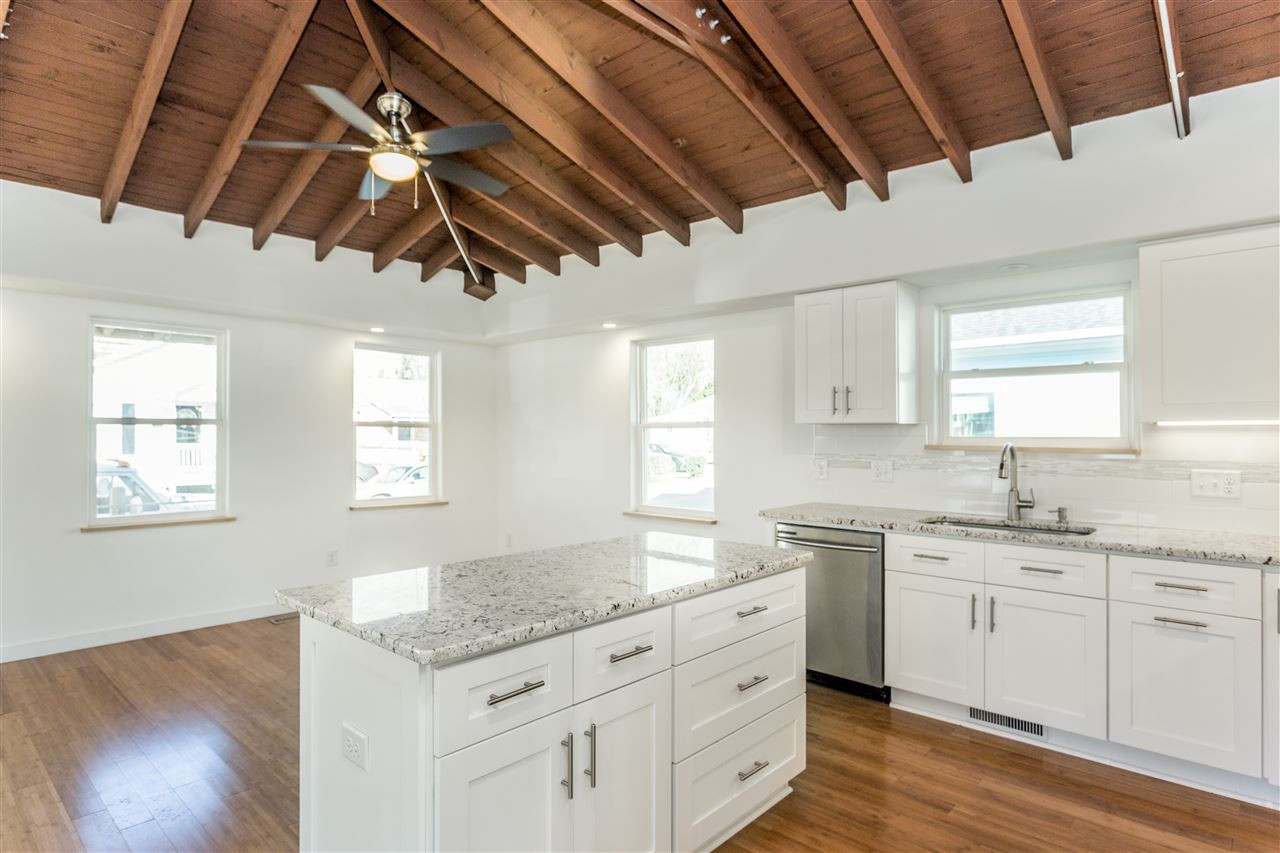 208 Bledsoe Avenue Raleigh, NC 27601 - Photo 3 of 16 Open kitchen/dining area with exposed original roof structure. Gorgeous! Kitchen