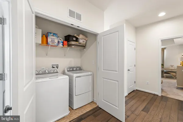 a view of storage and utility room in closet