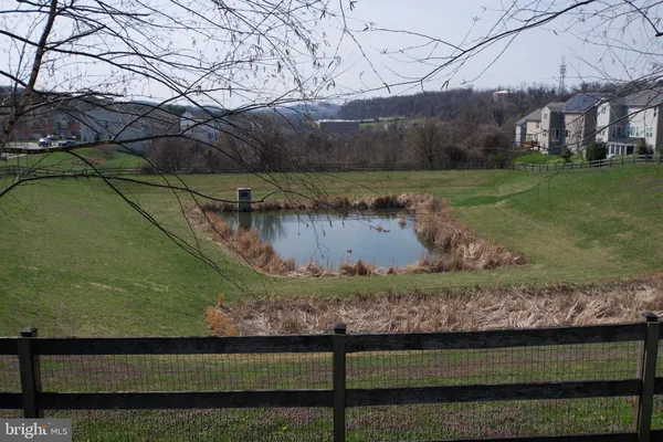 a black and white photo of a refrigerator