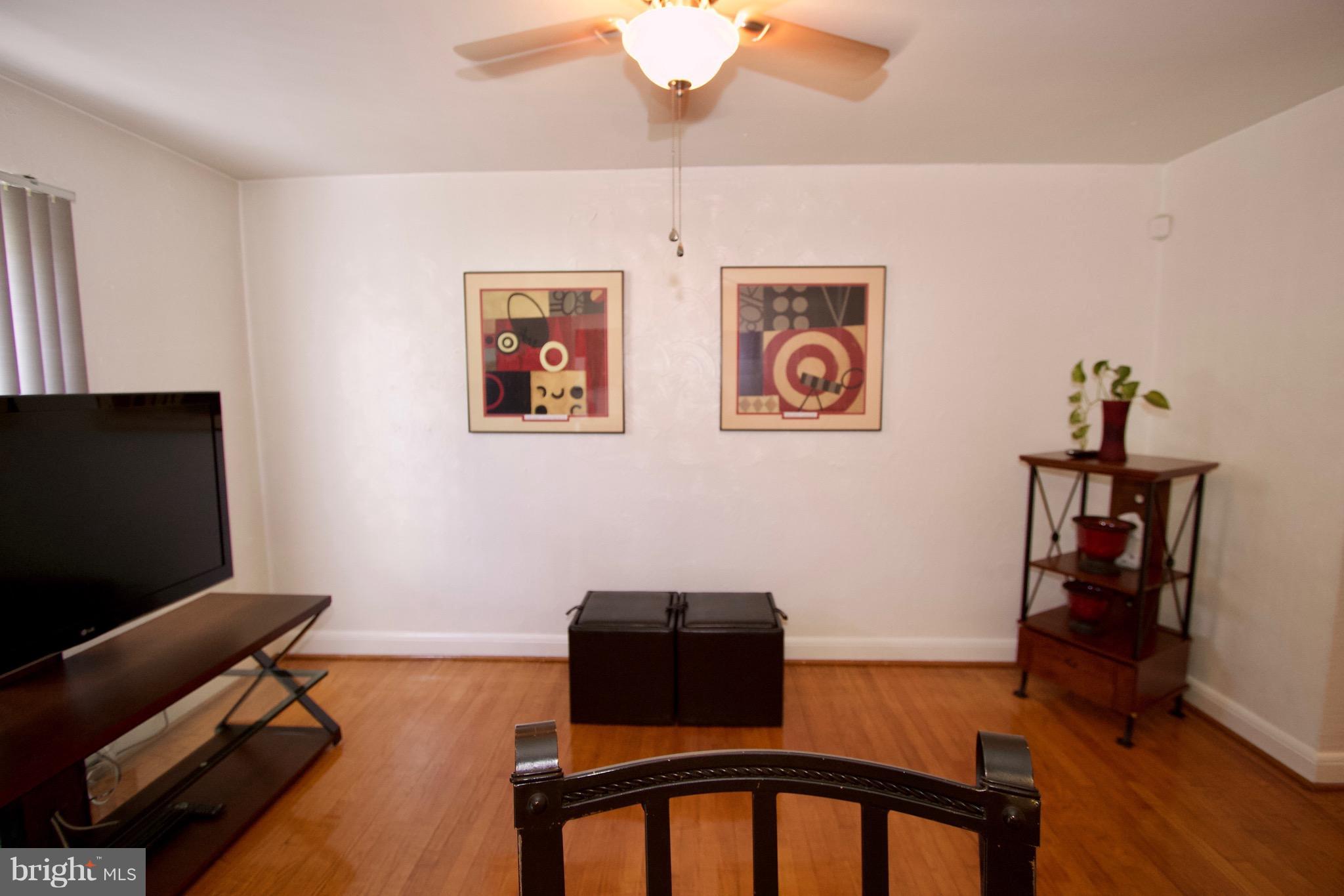 134 North Culver Street Baltimore, MD 21229 - Photo 11 of 30 a bedroom with furniture and a window