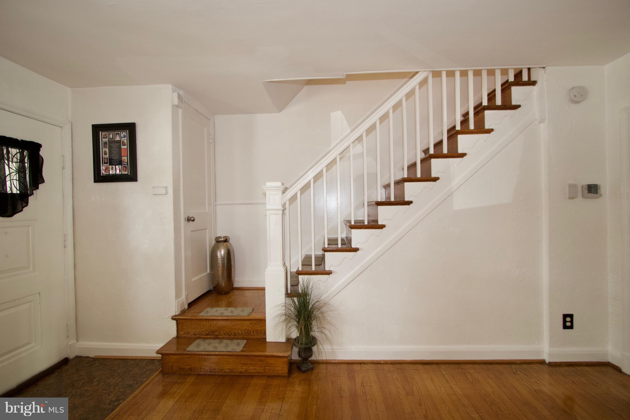 134 North Culver Street Baltimore, MD 21229 - Photo 15 of 30 a view of entryway and hall with wooden floor