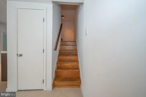 a view of a hallway with the door