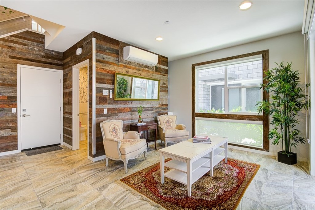 1678 Jetty Drive Costa Mesa, CA 92627 - Photo 12 of 72 a living room with furniture and a window