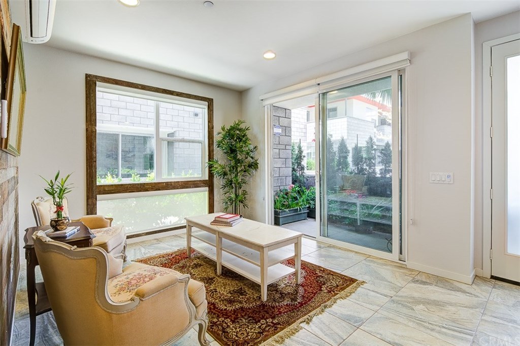 1678 Jetty Drive Costa Mesa, CA 92627 - Photo 14 of 72 a living room with furniture and a window