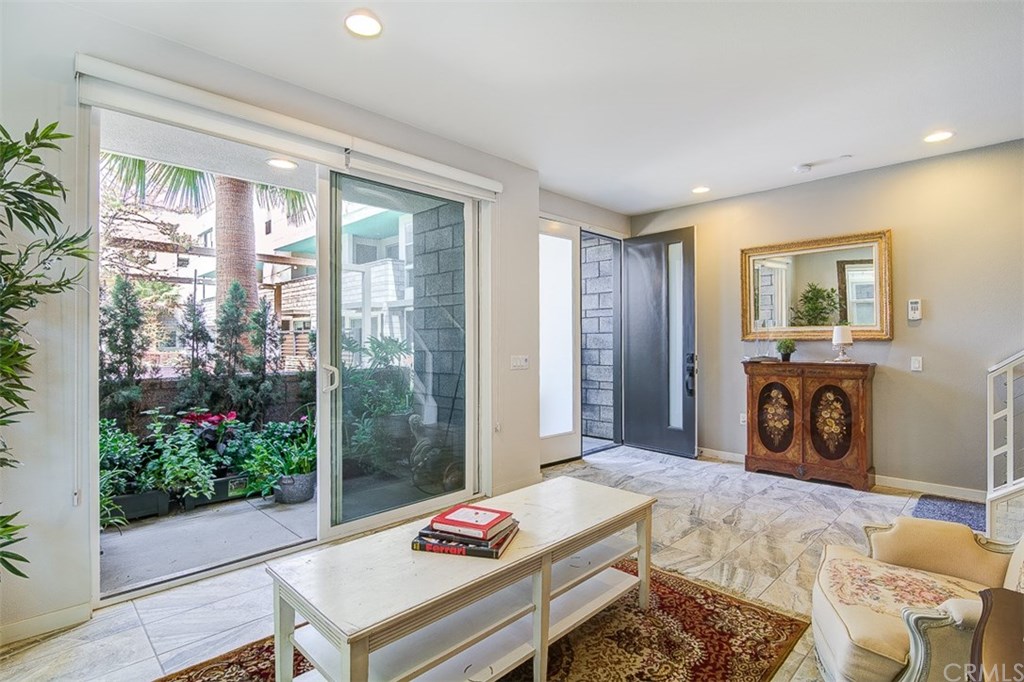 1678 Jetty Drive Costa Mesa, CA 92627 - Photo 15 of 72 a bed room with a bed and a television