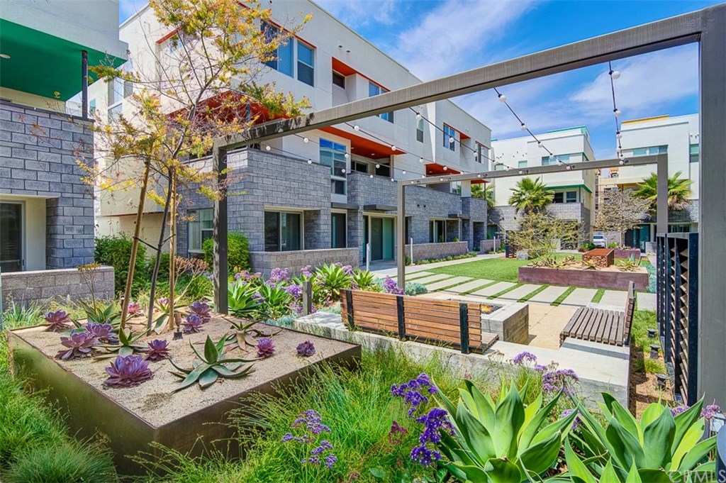 1678 Jetty Drive Costa Mesa, CA 92627 - Photo 2 of 72 a view of a patio with table and chairs and potted plants