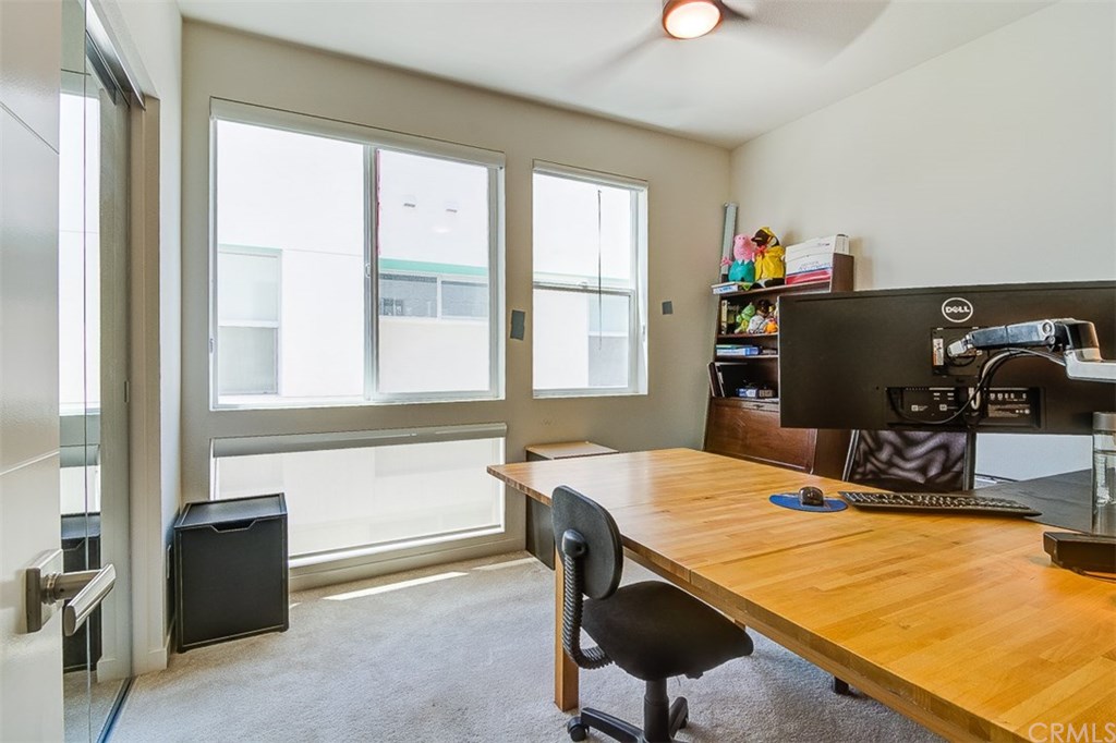 1678 Jetty Drive Costa Mesa, CA 92627 - Photo 48 of 72 a view of a workspace with furniture and a window