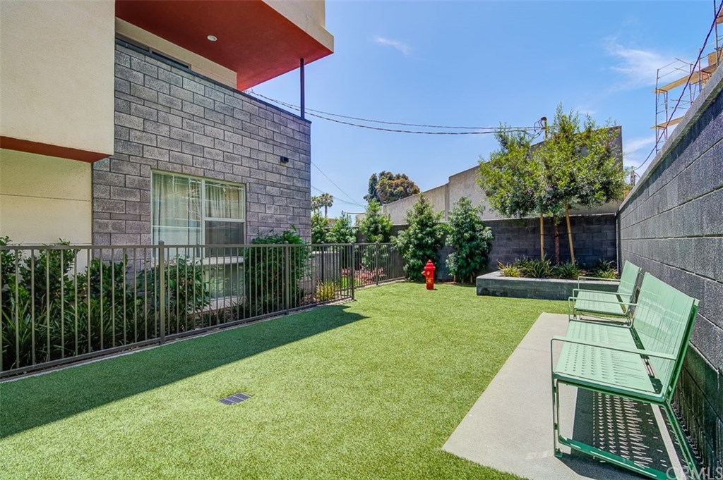 1678 Jetty Drive Costa Mesa, CA 92627 - Photo 65 of 72 a view of a chair and table in backyard of the house