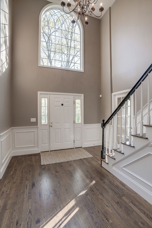 40 Partridge Road Windham, NH 03087 - Photo 11 of 42 a view of entryway and hall with wooden floor