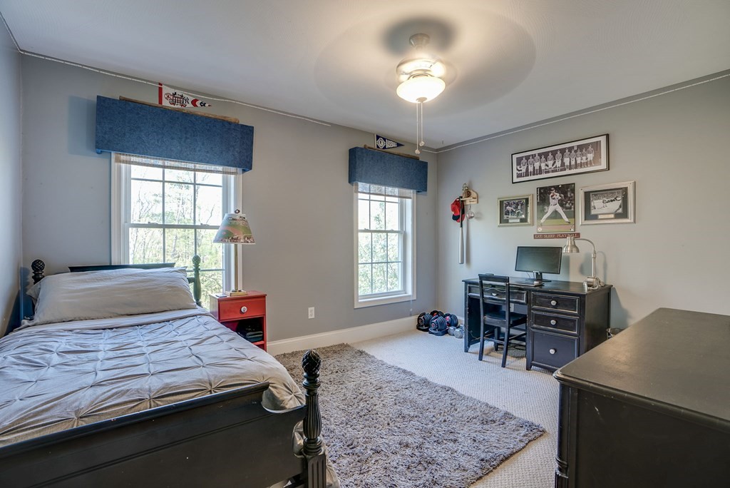 40 Partridge Road Windham, NH 03087 - Photo 32 of 42 a bedroom with a bed and furniture