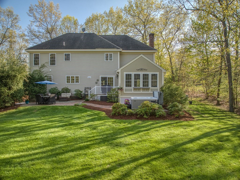 40 Partridge Road Windham, NH 03087 - Photo 7 of 42 a front view of a house with a garden