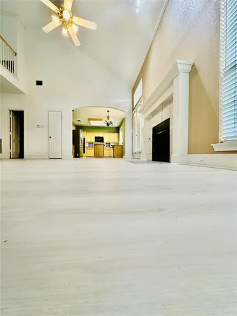 a view of a kitchen with furniture and a kitchen counter space