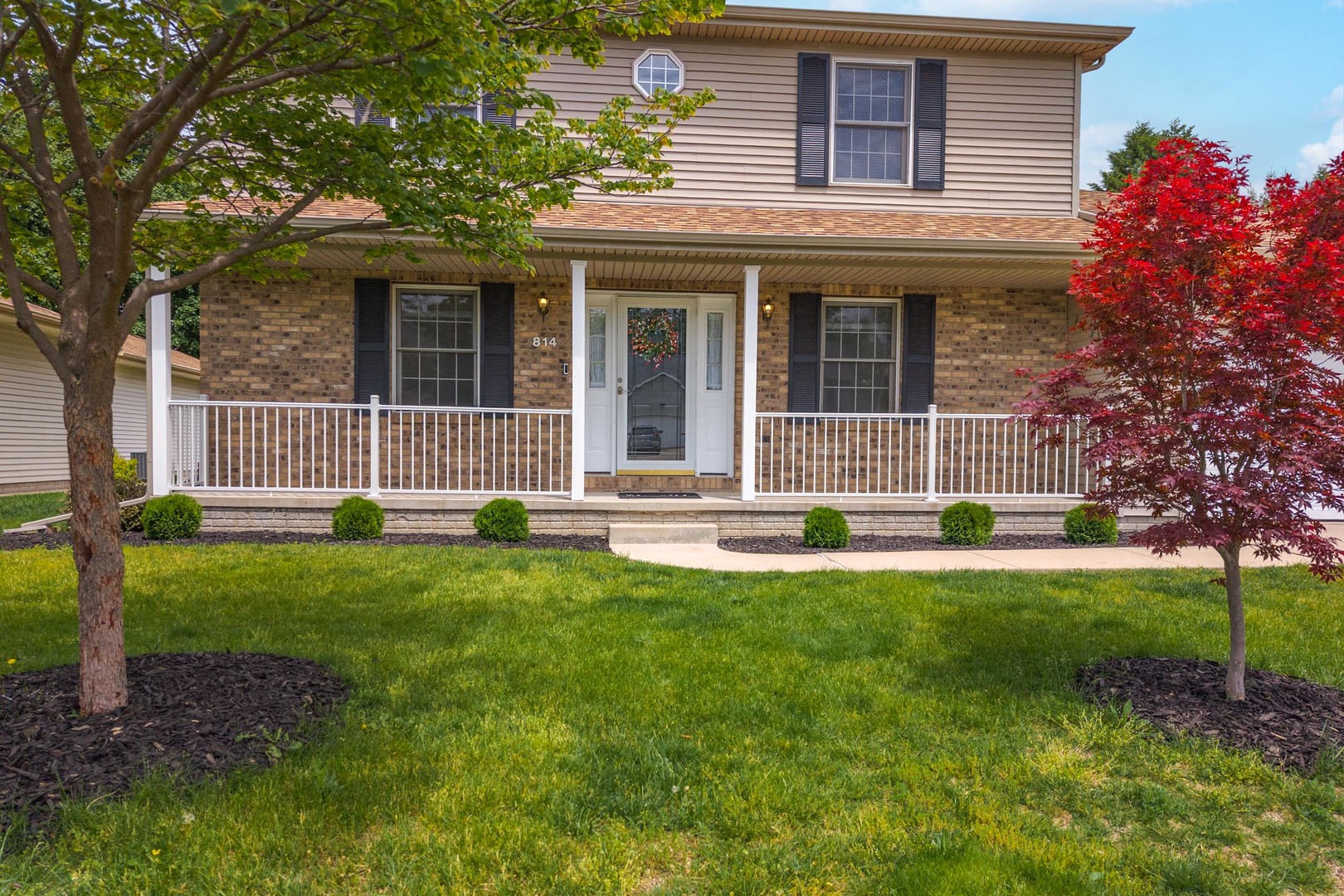 814 Landau Lane Normal, IL 61761 - Photo 50 of 58 front view of a house with a yard