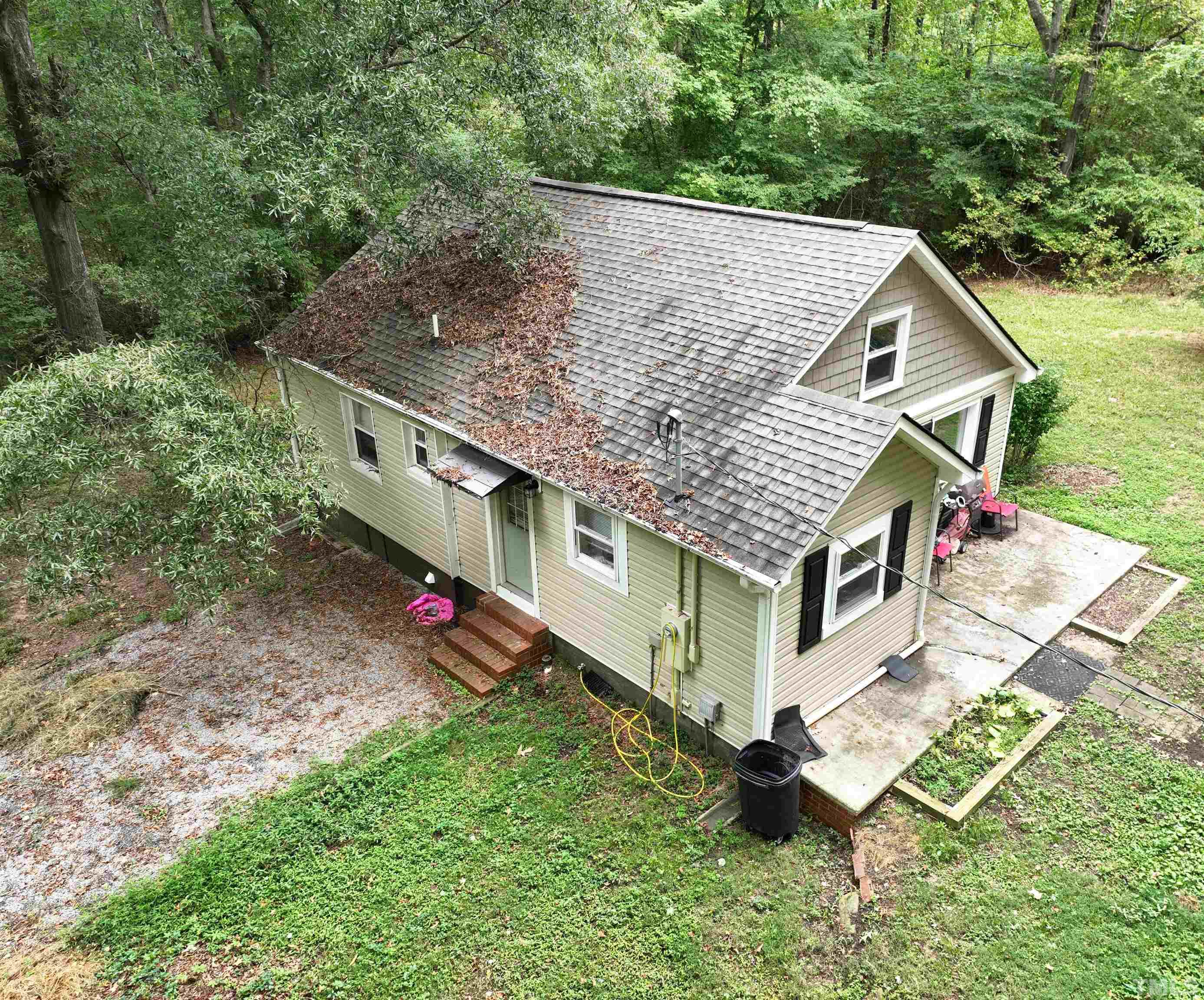 1539 Deep River Road Sanford, NC 27330 - Photo 13 of 34 an aerial view of a house with a yard