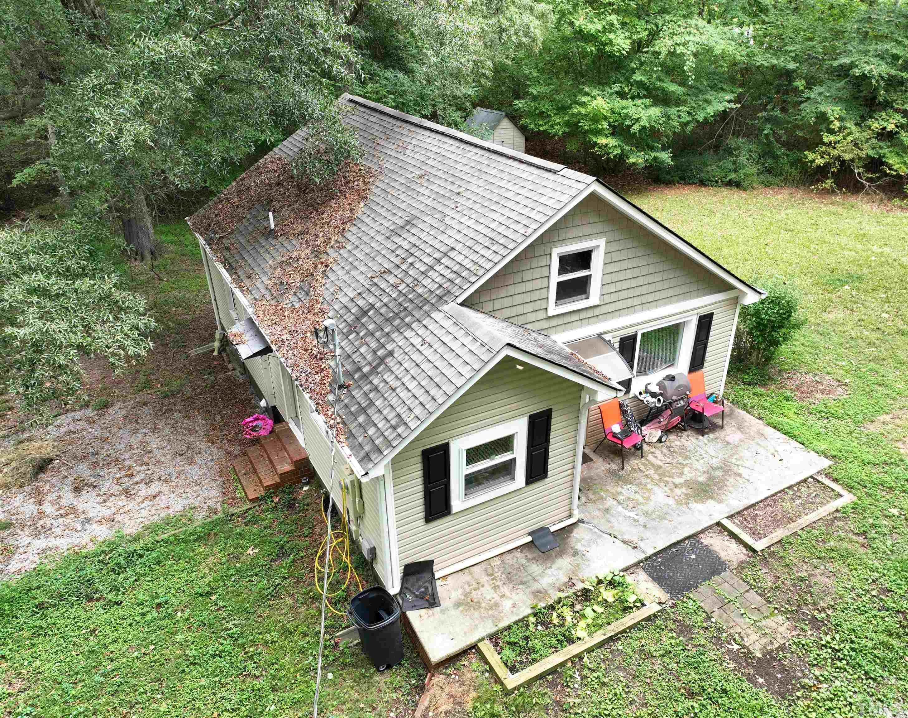 1539 Deep River Road Sanford, NC 27330 - Photo 15 of 34 a view of a house with yard and sitting area