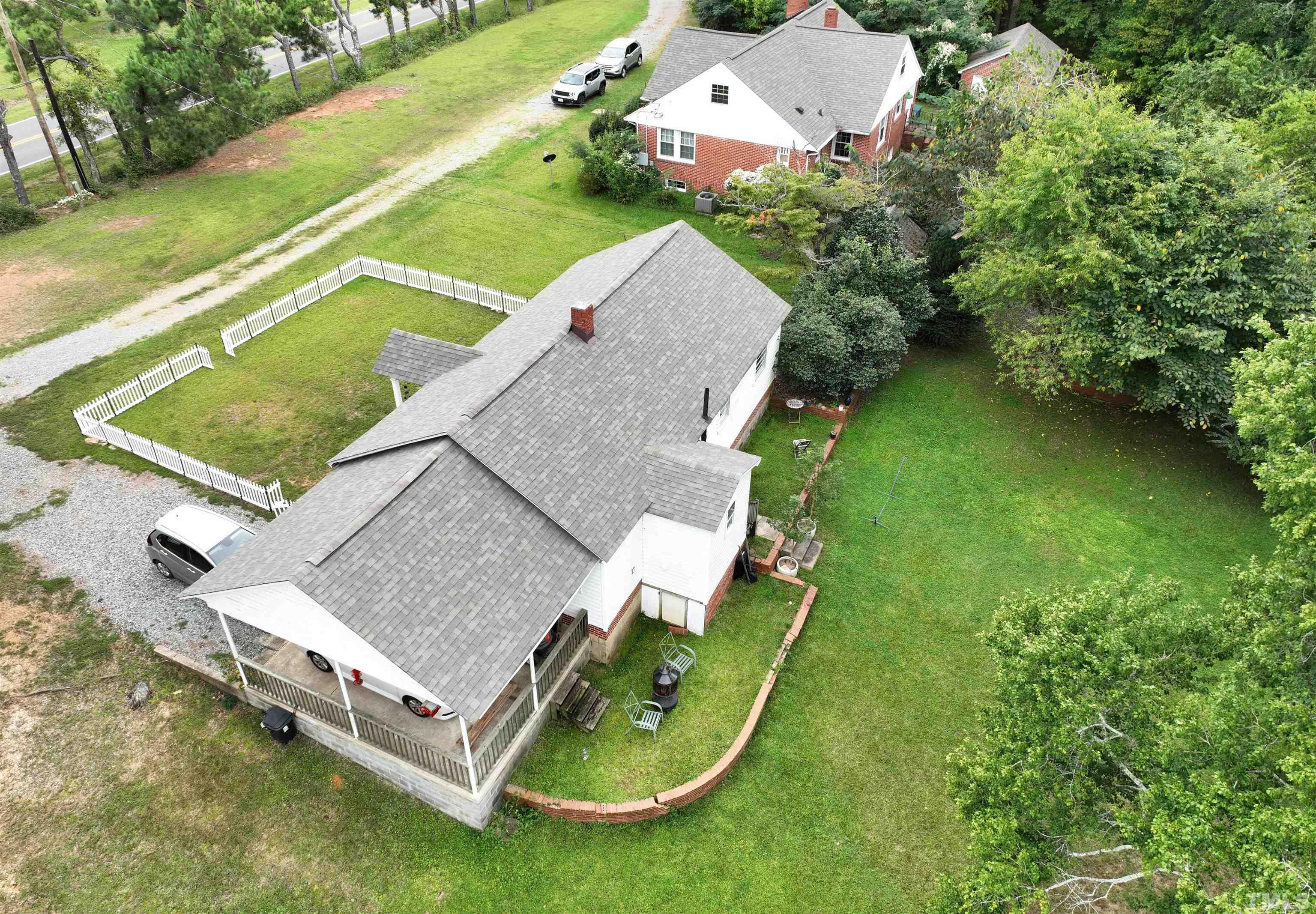 1539 Deep River Road Sanford, NC 27330 - Photo 17 of 34 an aerial view of a house