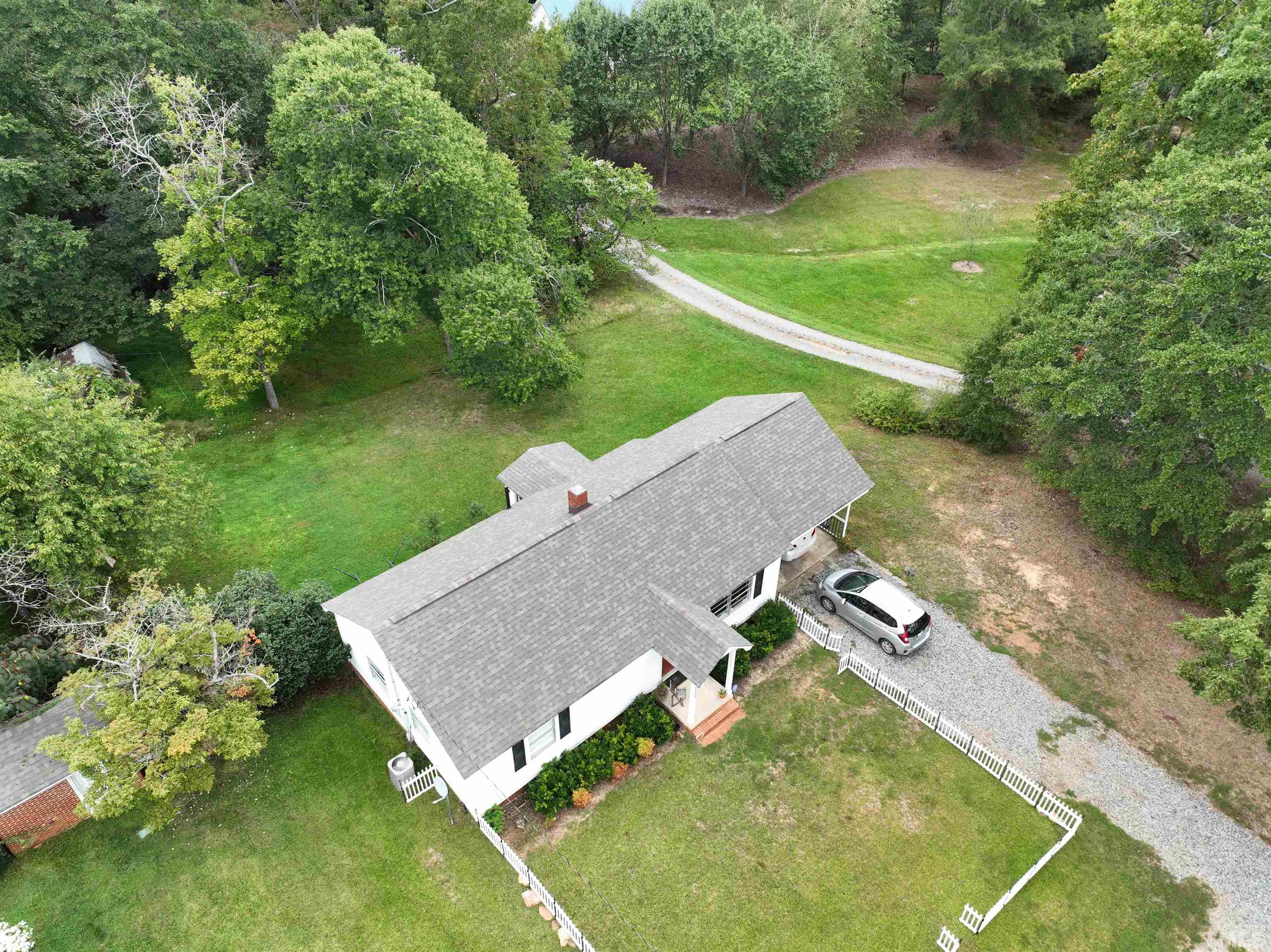 1539 Deep River Road Sanford, NC 27330 - Photo 24 of 34 an aerial view of a house