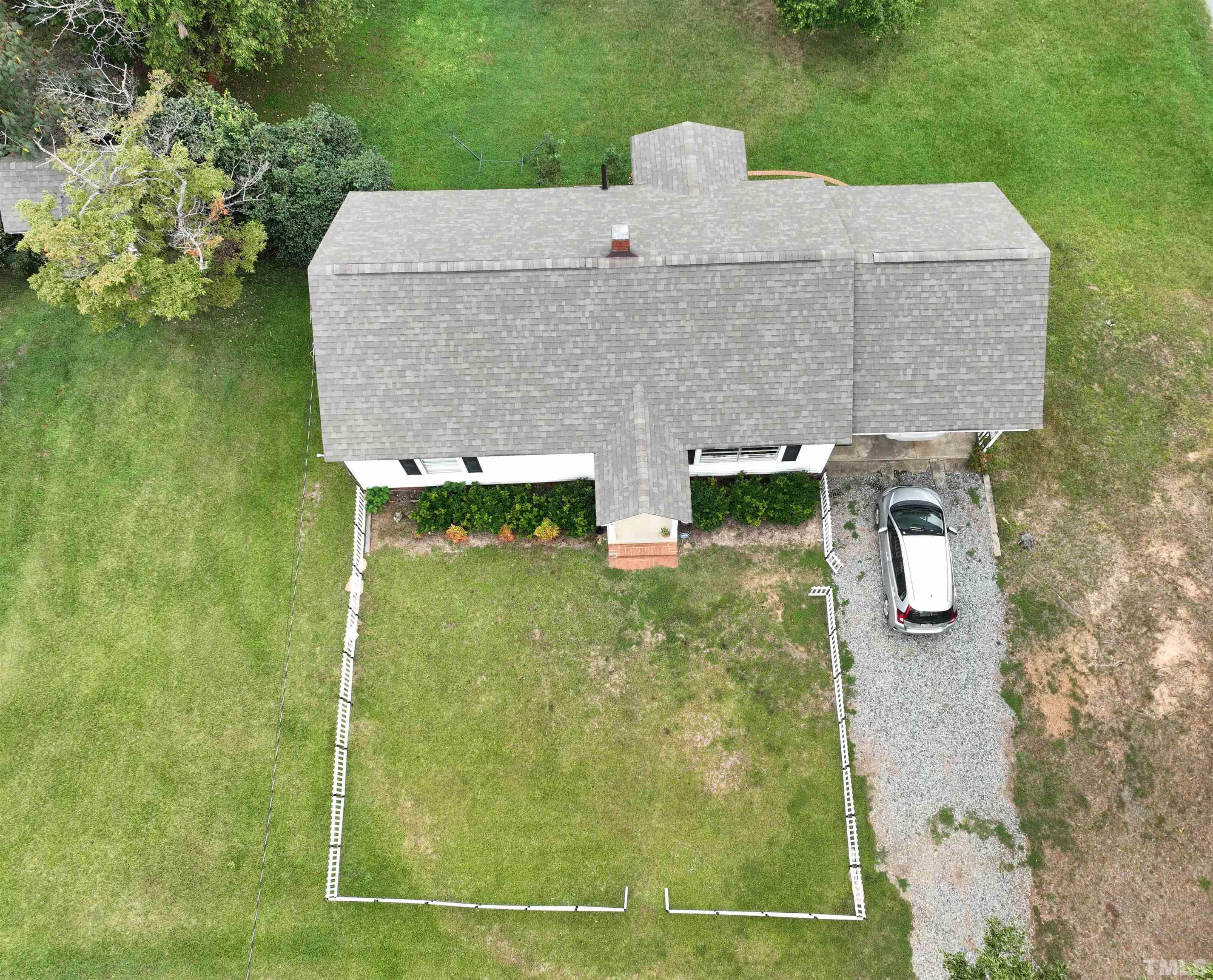 1539 Deep River Road Sanford, NC 27330 - Photo 26 of 34 an aerial view of a house with a yard