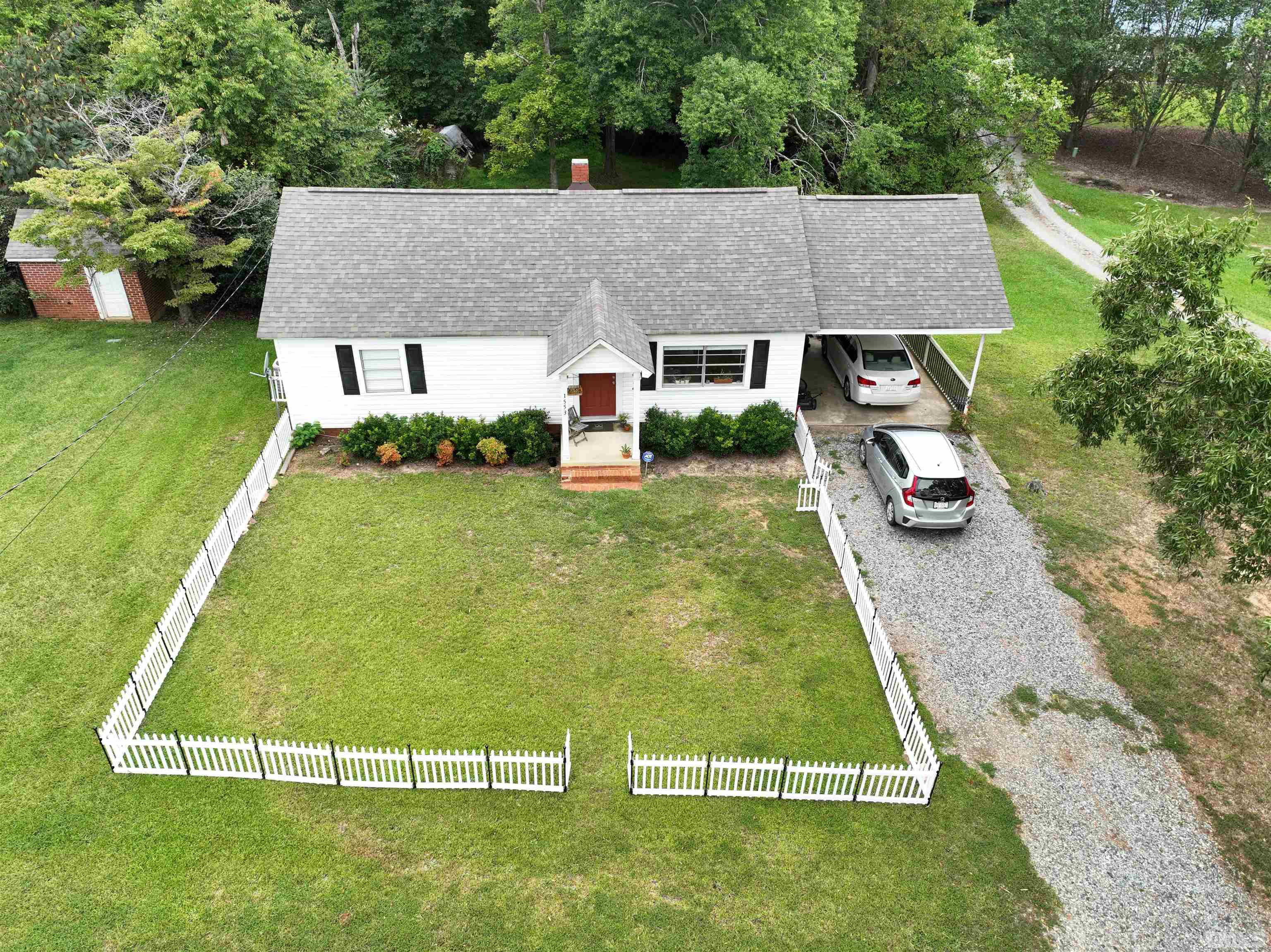 1539 Deep River Road Sanford, NC 27330 - Photo 27 of 34 an aerial view of a house