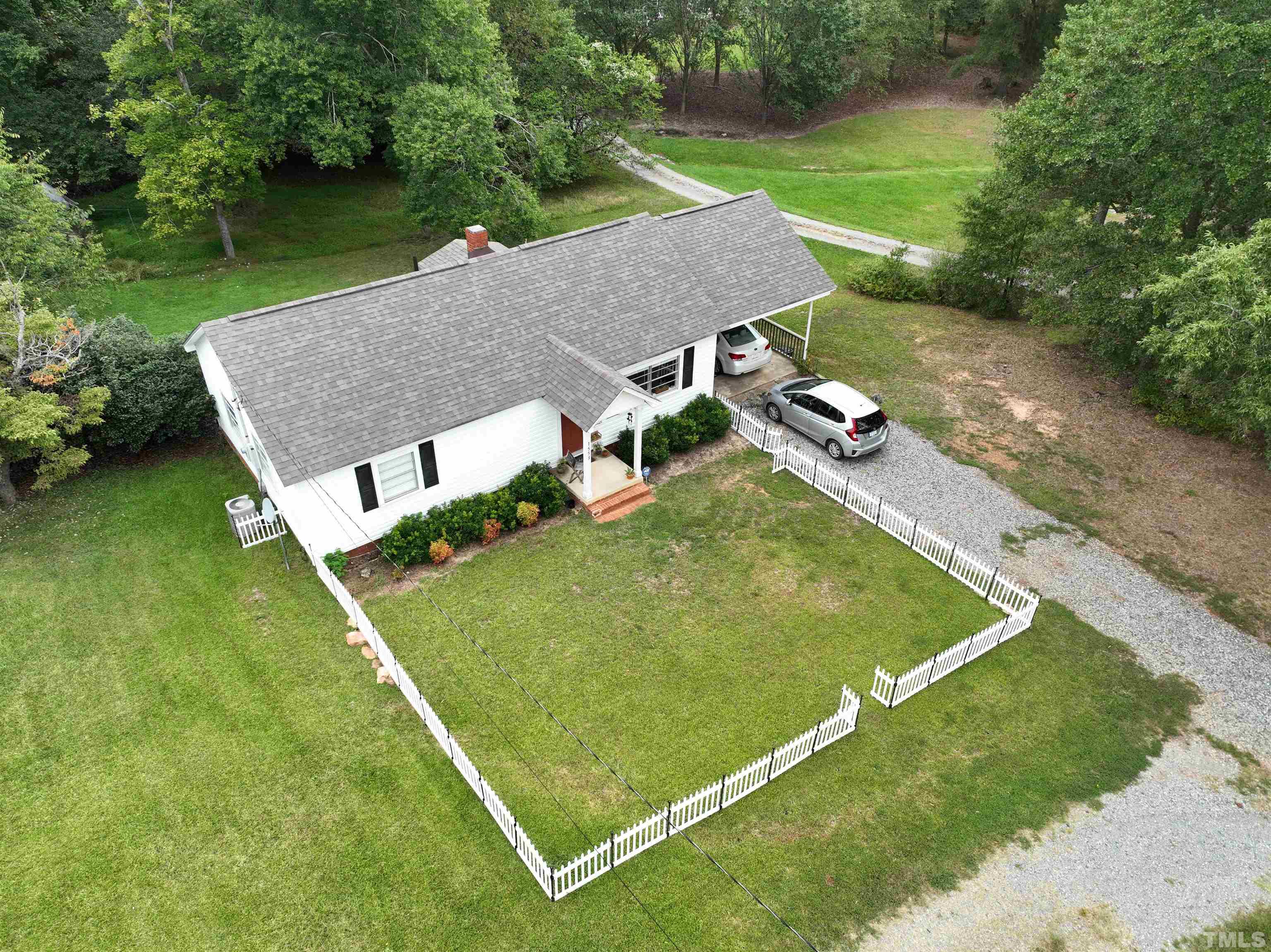 1539 Deep River Road Sanford, NC 27330 - Photo 28 of 34 an aerial view of a house