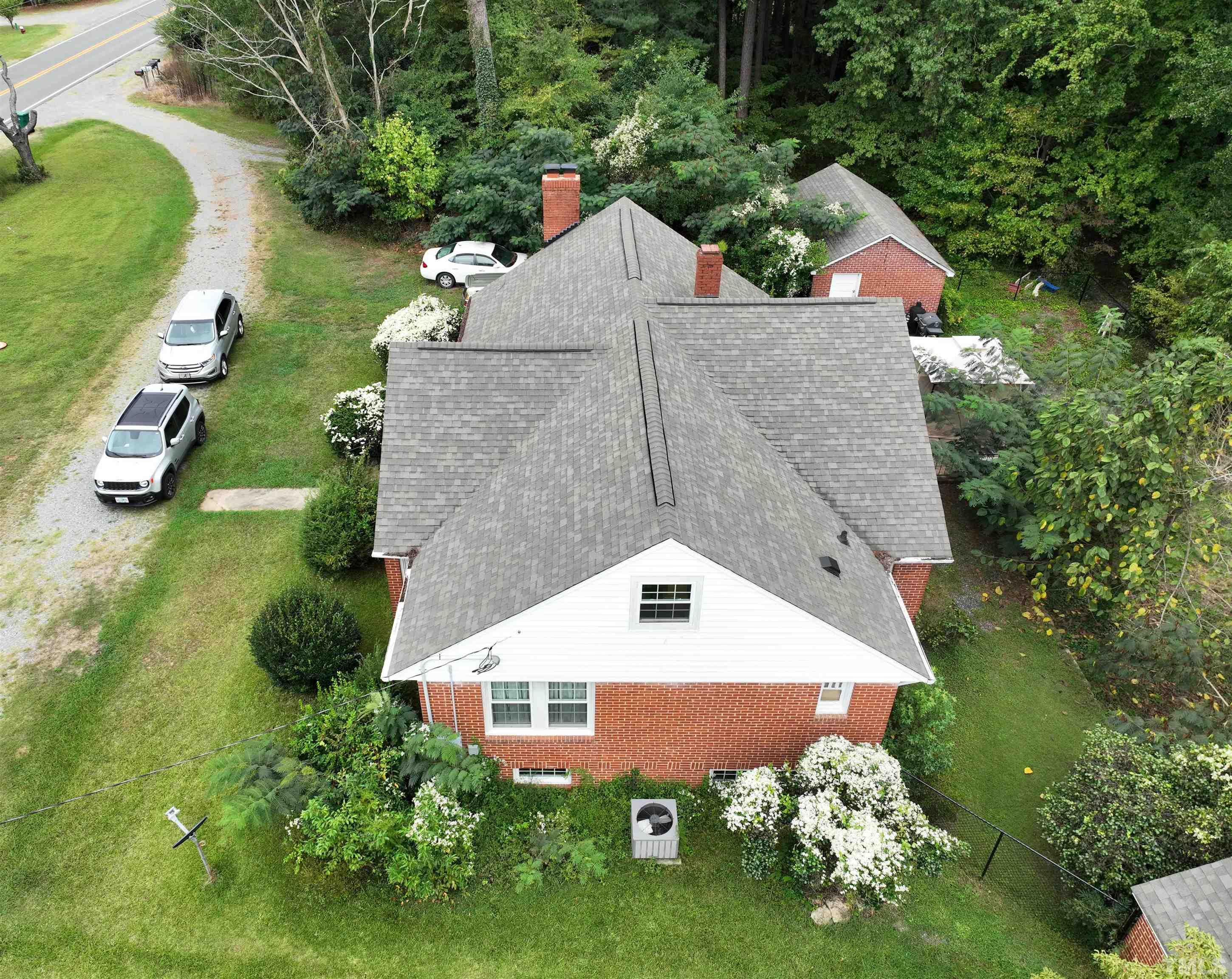 1539 Deep River Road Sanford, NC 27330 - Photo 3 of 34 an aerial view of a house