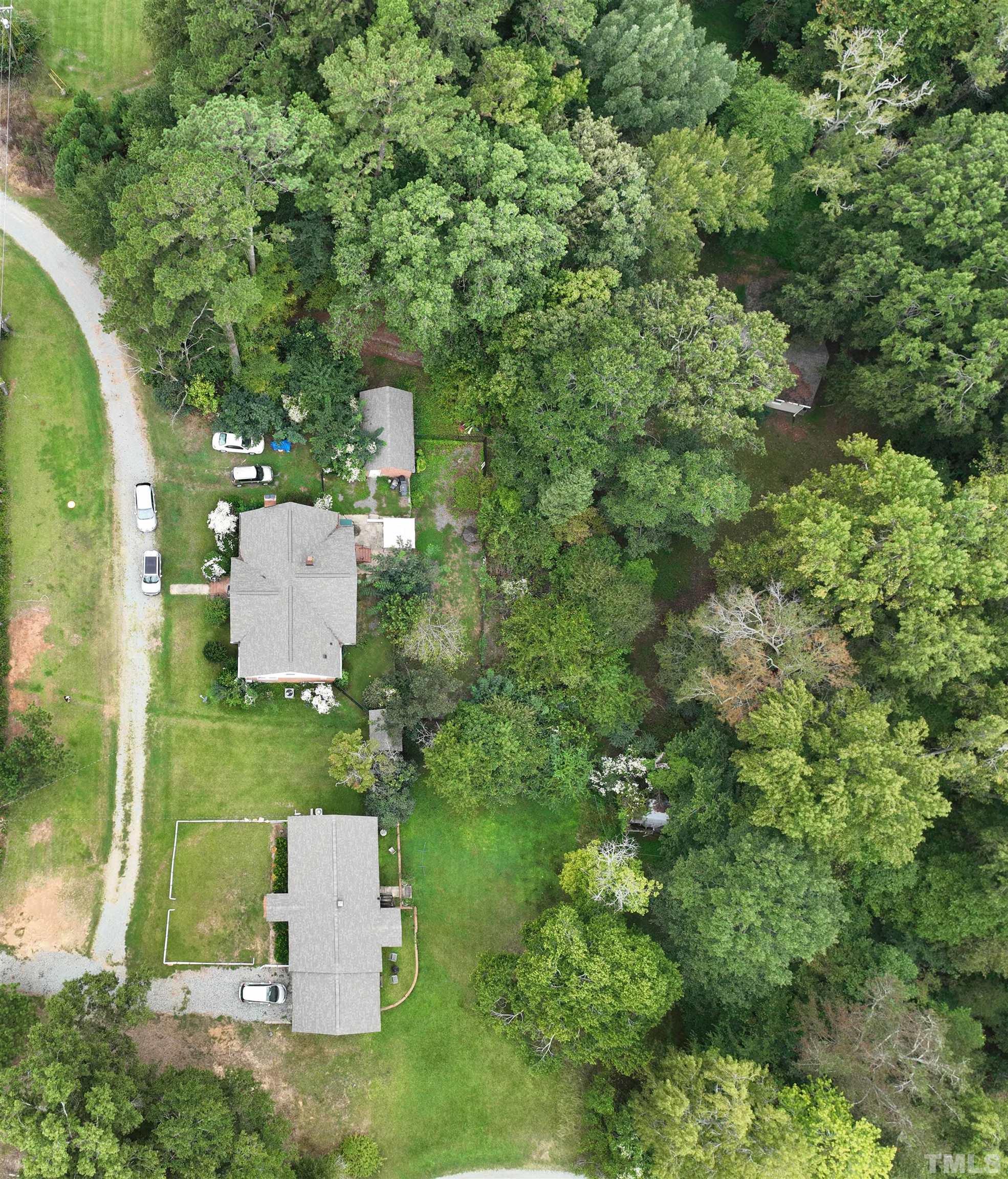 1539 Deep River Road Sanford, NC 27330 - Photo 5 of 34 an aerial view of residential house with outdoor space and trees all around
