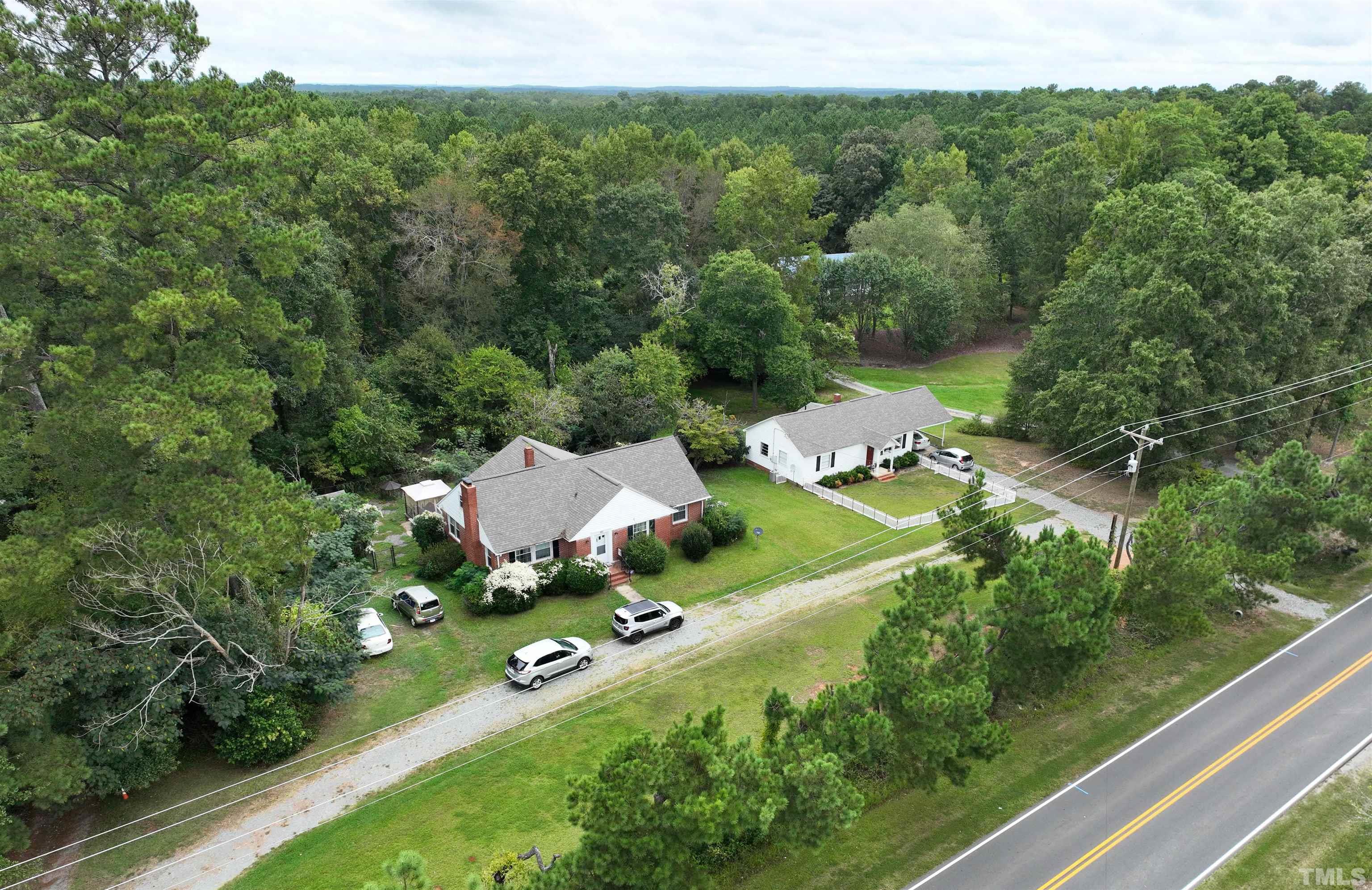 1539 Deep River Road Sanford, NC 27330 - Photo 8 of 34 an aerial view of multiple house