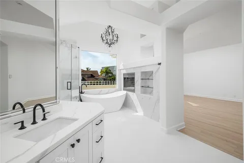 a kitchen with sink cabinets and window