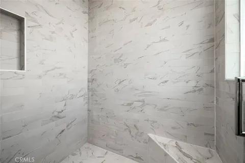 a utility room with sink dryer and washer