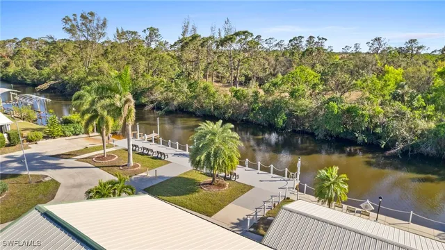 a view of a swimming pool with a patio and a garden