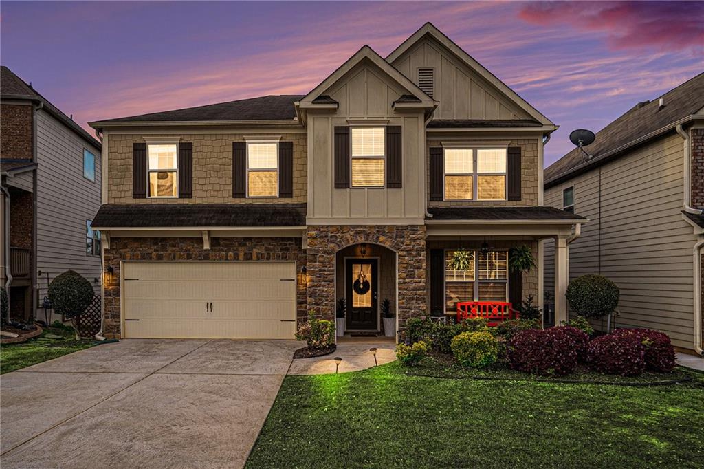 802 Harrison Drive Acworth, GA 30102 - Photo 1 of 1 a front view of a house with a yard and garage