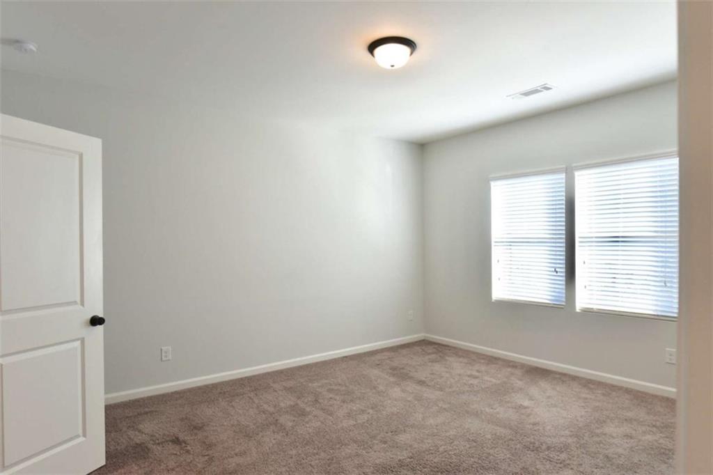 809 Cameron Trail Acworth, GA 30102 - Photo 21 of 38 an empty room with a window