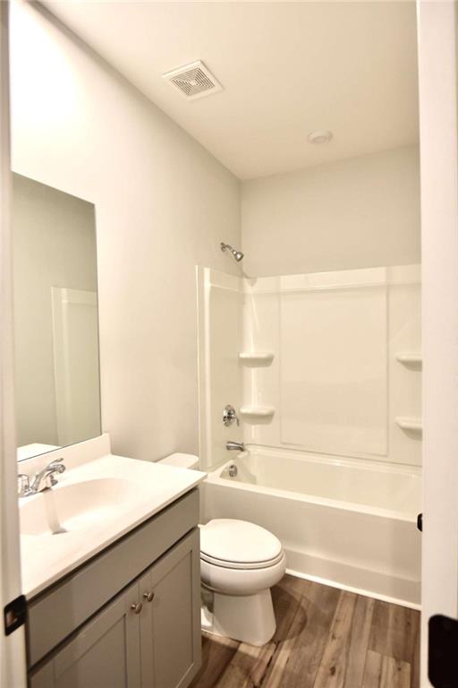 809 Cameron Trail Acworth, GA 30102 - Photo 29 of 38 a bathroom with a sink a toilet and a bathtub