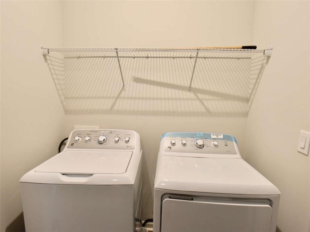 809 Cameron Trail Acworth, GA 30102 - Photo 30 of 38 a utility room with dryer and washer