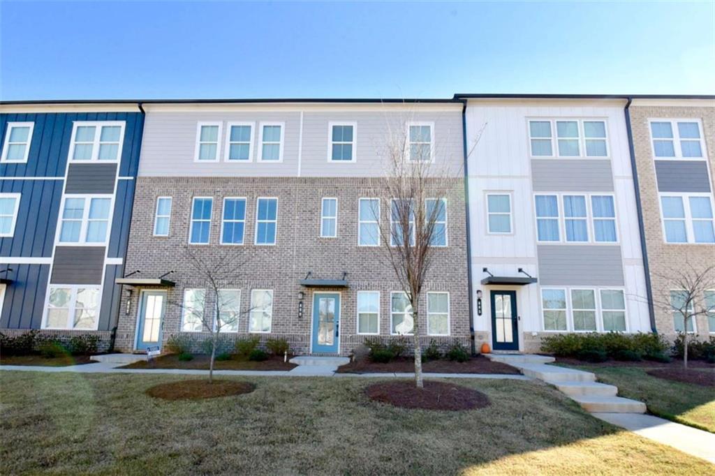 809 Cameron Trail Acworth, GA 30102 - Photo 34 of 38 a front view of a building with a yard