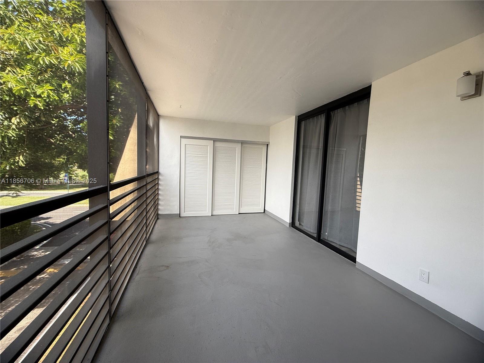 20200 West Country Club Drive, Unit PH14 Aventura, FL 33180 - Photo 6 of 15 a view of a room with wooden stairs