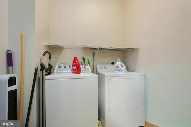 a view of a workspace with furniture