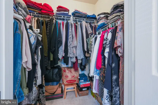 a bathroom with a sink vanity and a mirror