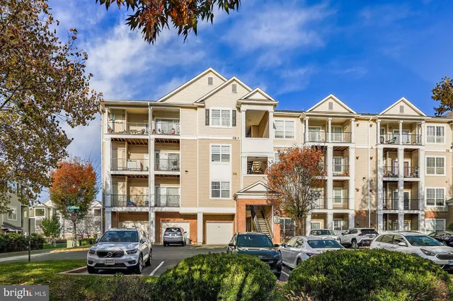 a view of a street with a building in the background