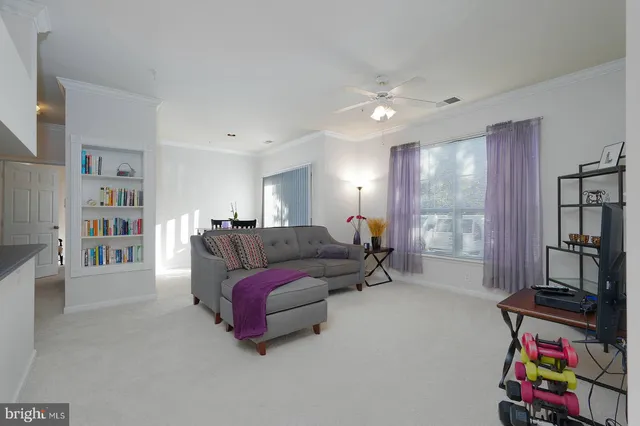 a view of a livingroom with furniture