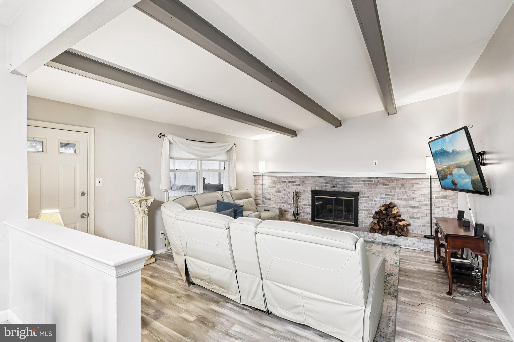 721 Chatham Road Somerdale, NJ 08083 - Photo 16 of 42 Vaulted ceiling with beams, door to back porch