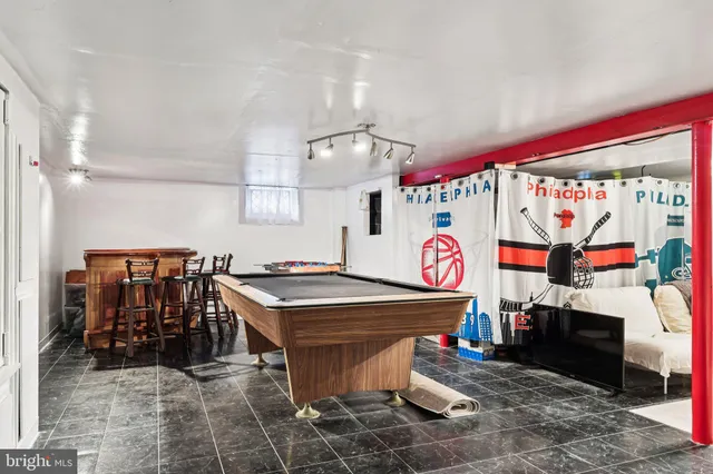 a outdoor space with lots of furniture and clutter