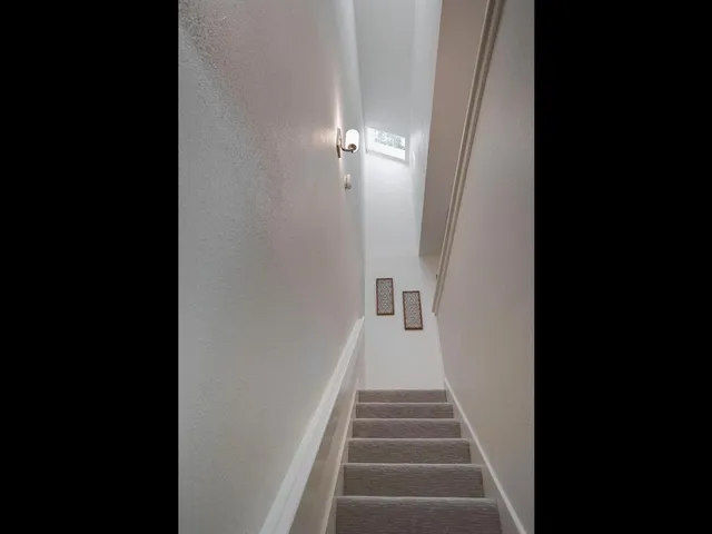 a view of a hallway with closet