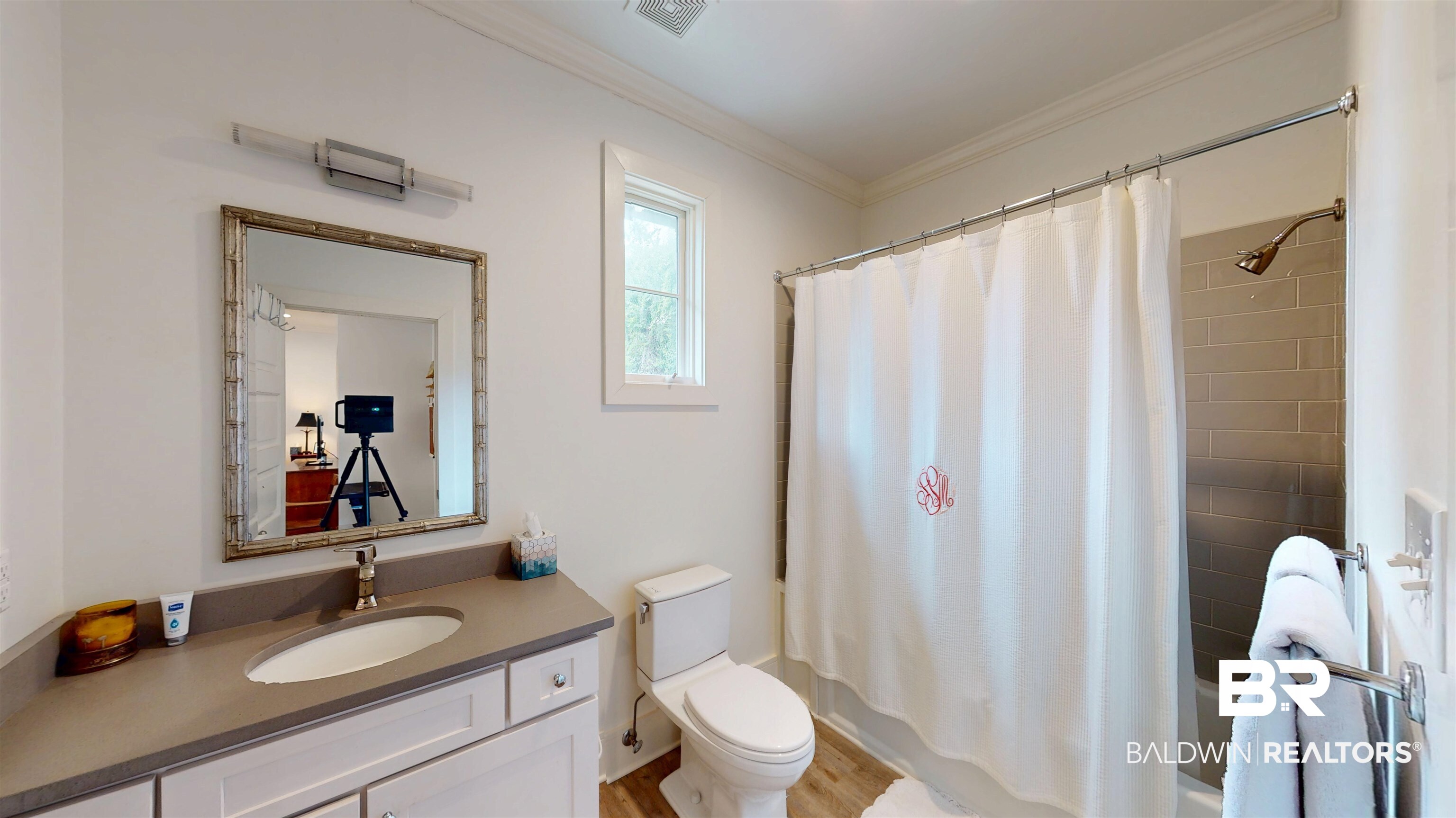 211 Lanier Avenue Mobile, AL 36607 - Photo 73 of 73 Bathroom with crown molding, vanity, shower / bathtub combination with curtain, and wood finished floors