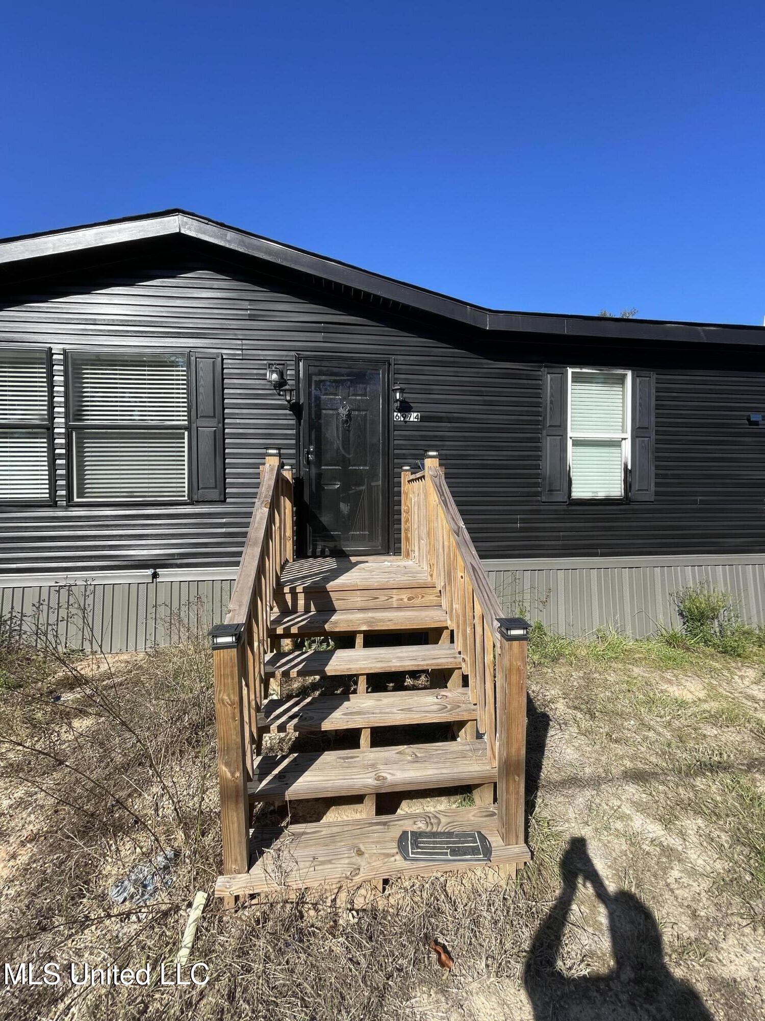 6974 Kiln Delisle Road Pass Christian, MS 39571 - Photo 3 of 8 Front step
