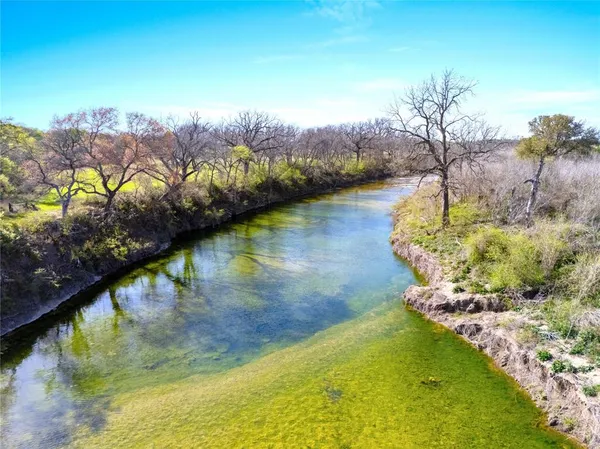 a view of a lake from a yard