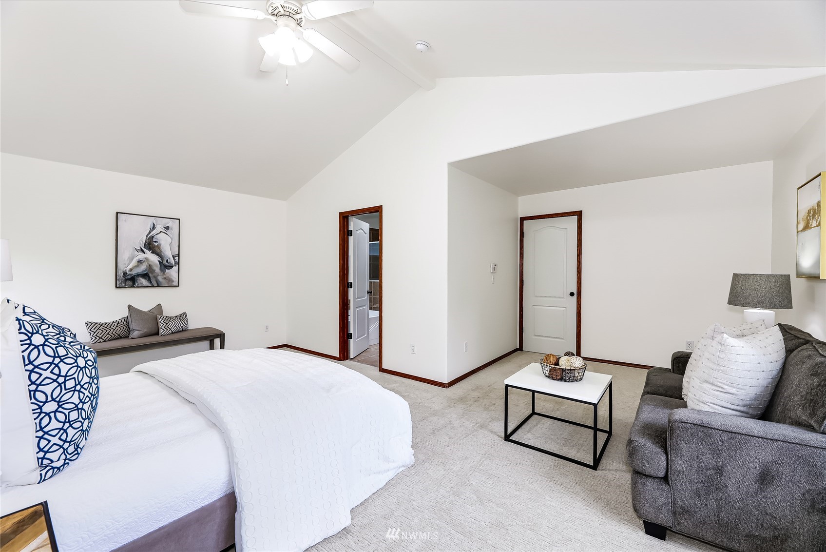131 197th Street Southwest Bothell, WA 98012 - Photo 17 of 27 a bedroom with furniture and a bed