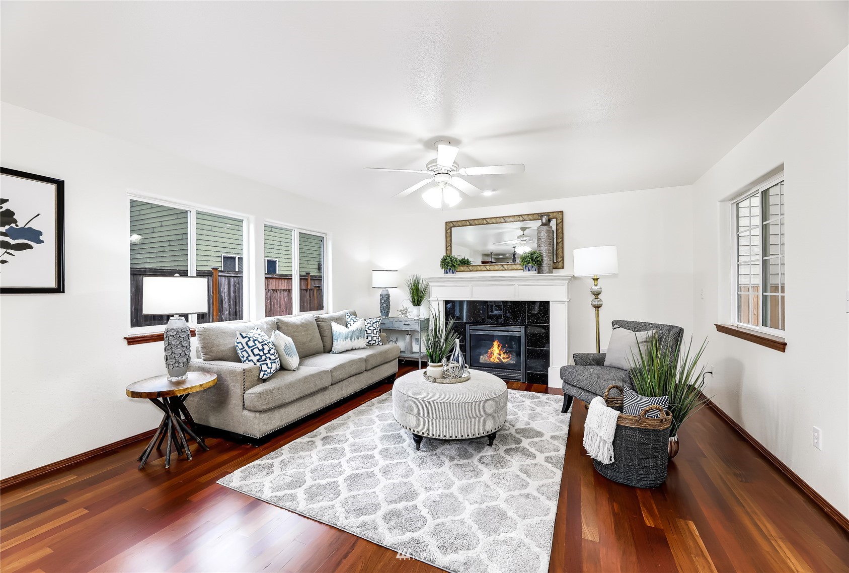 131 197th Street Southwest Bothell, WA 98012 - Photo 6 of 27 a living room with furniture and a fireplace