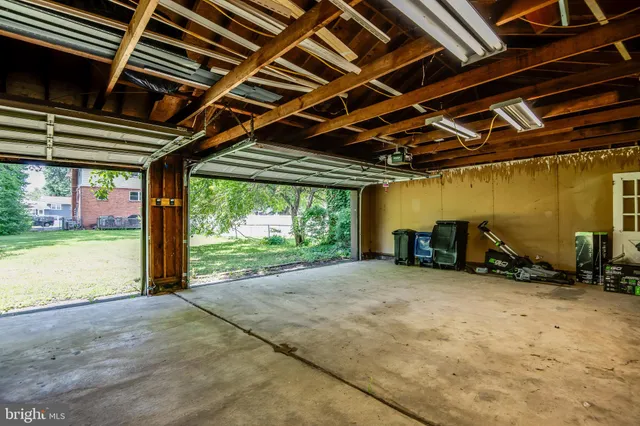 a view of a room with wooden walls