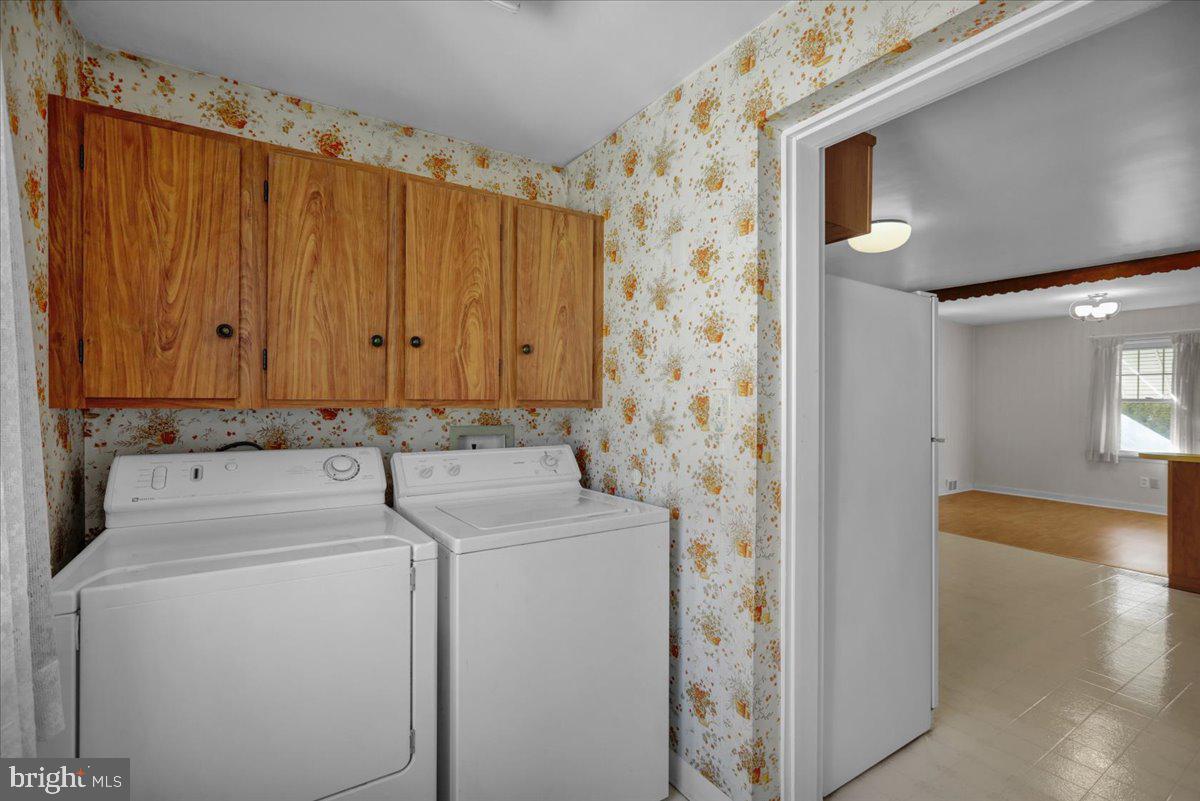 1510 Garfield Avenue Wyomissing, PA 19610 - Photo 11 of 26 a bathroom with a sink and a shower curtain